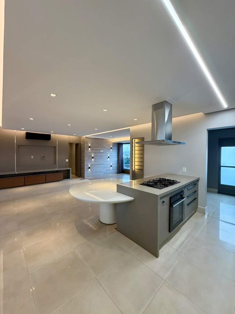 Living integrado à cozinha com ilha