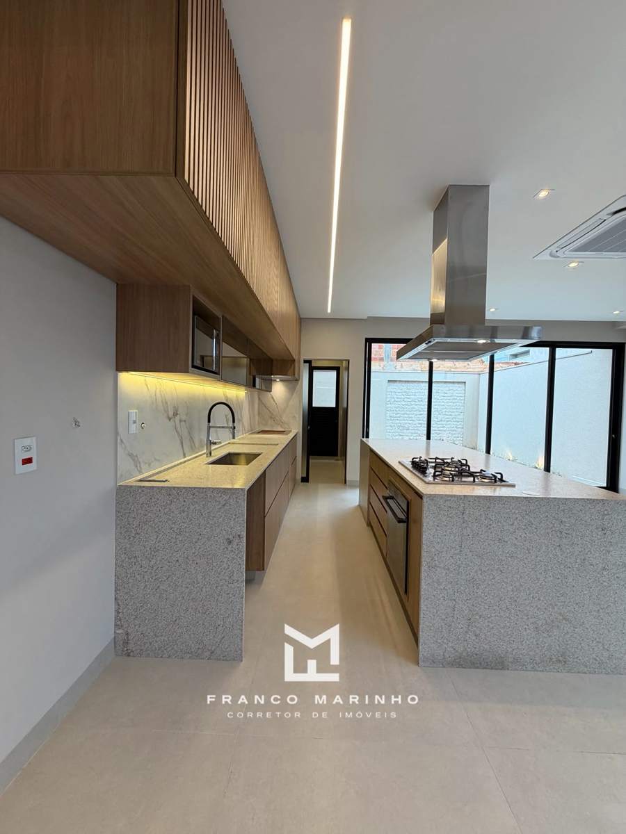 Cozinha com ilha e cooktop
