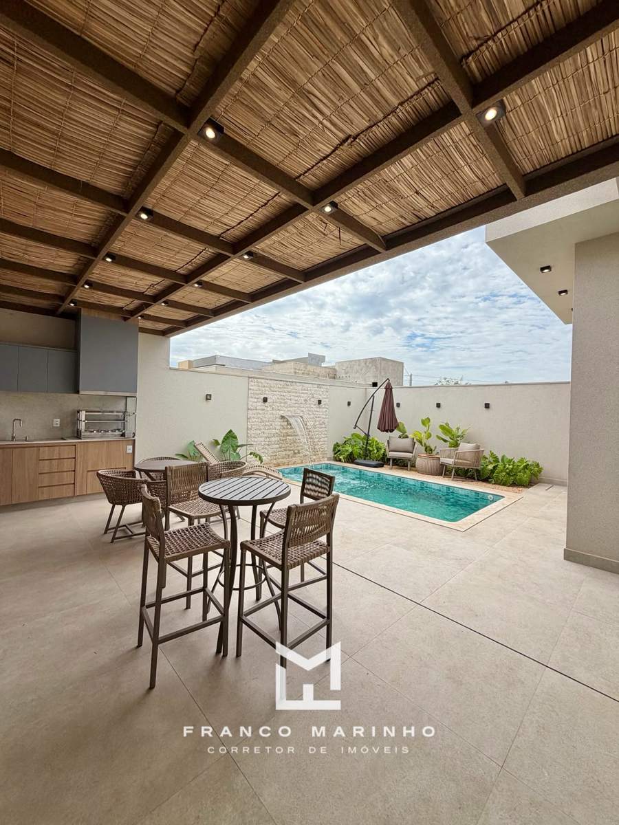 Varanda gourmet coberta com vista para a piscina