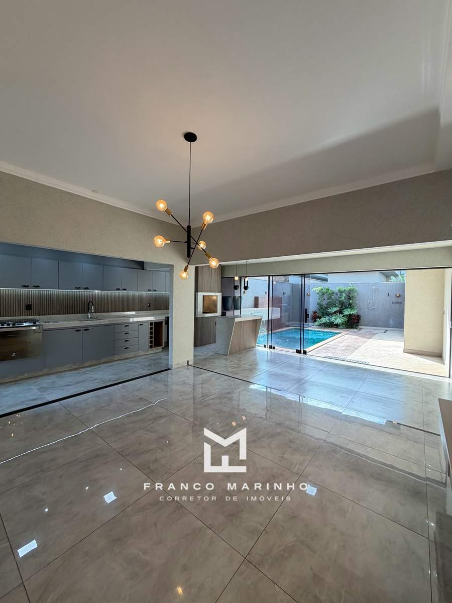 Espaço gourmet integrado com vista para a piscina