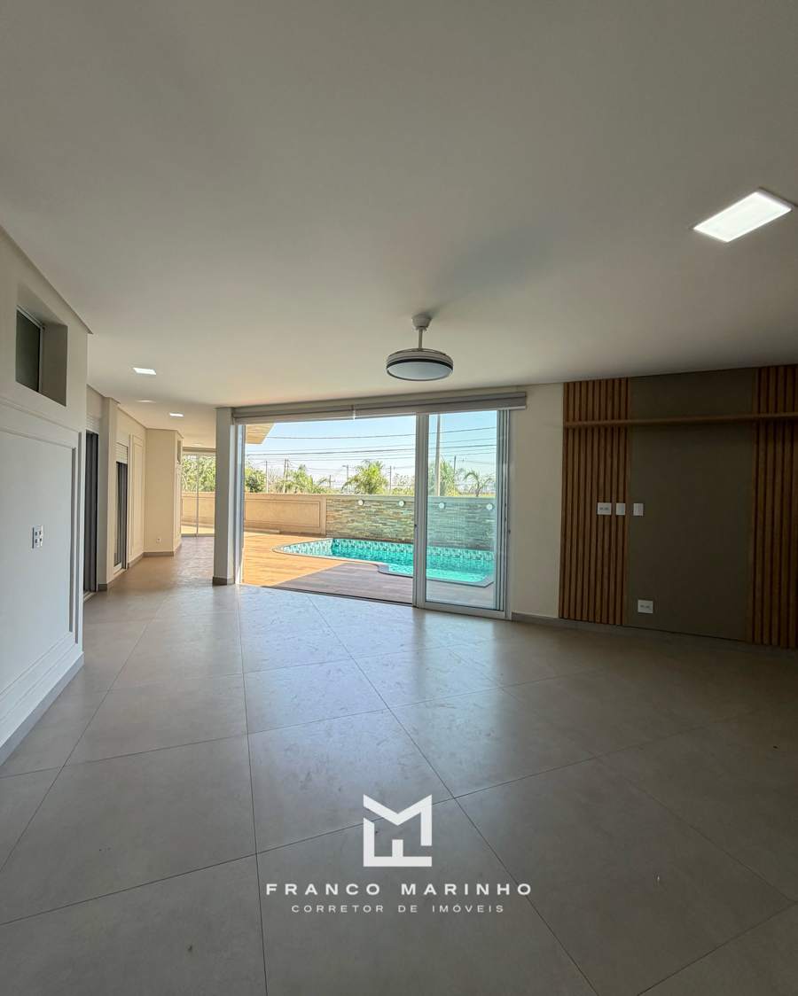 Living aberto para a piscina