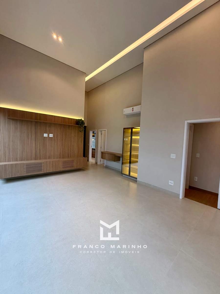 Sala com adega iluminada